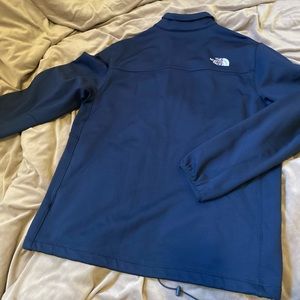 The North Face zip up sweater . Worn maybe once or twice. Size LG